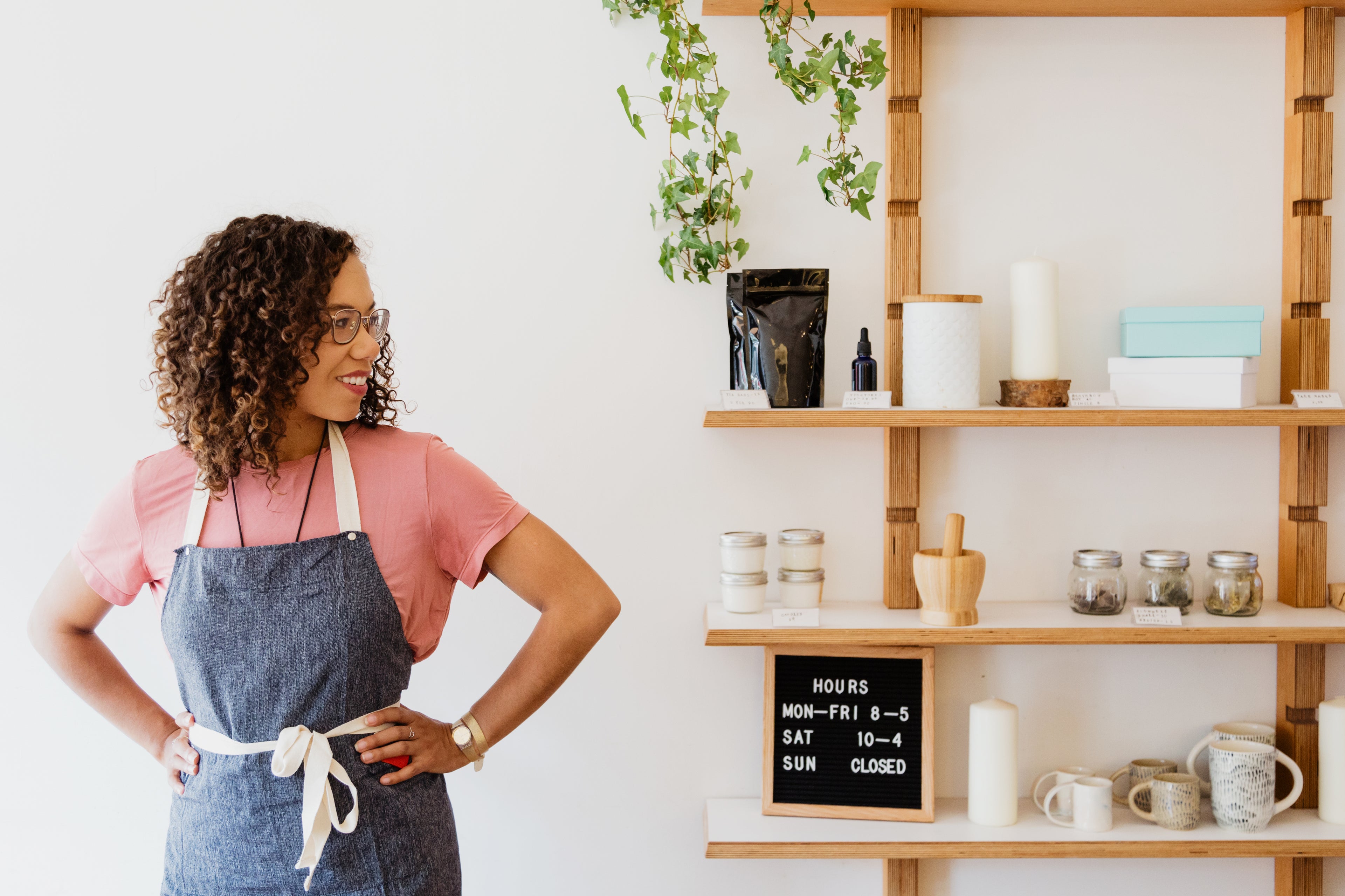 woman standing in her retail shop